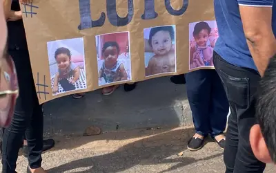Moradores fazem protesto em frente a creche de Várzea Grande (MT) em que bebê de 5 meses morreu